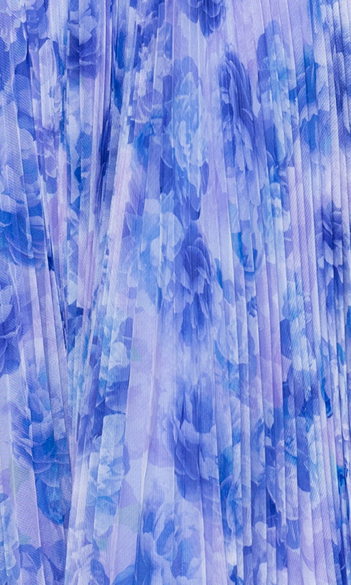 Close-up of pleated fabric with a blue and purple floral pattern, ideal for the Midi Wedding Guest Dress: Betsy & Adam A27053.